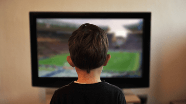 Child watching football