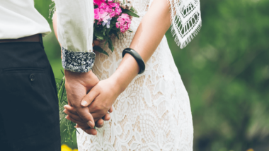 Bride and Groom holding hands